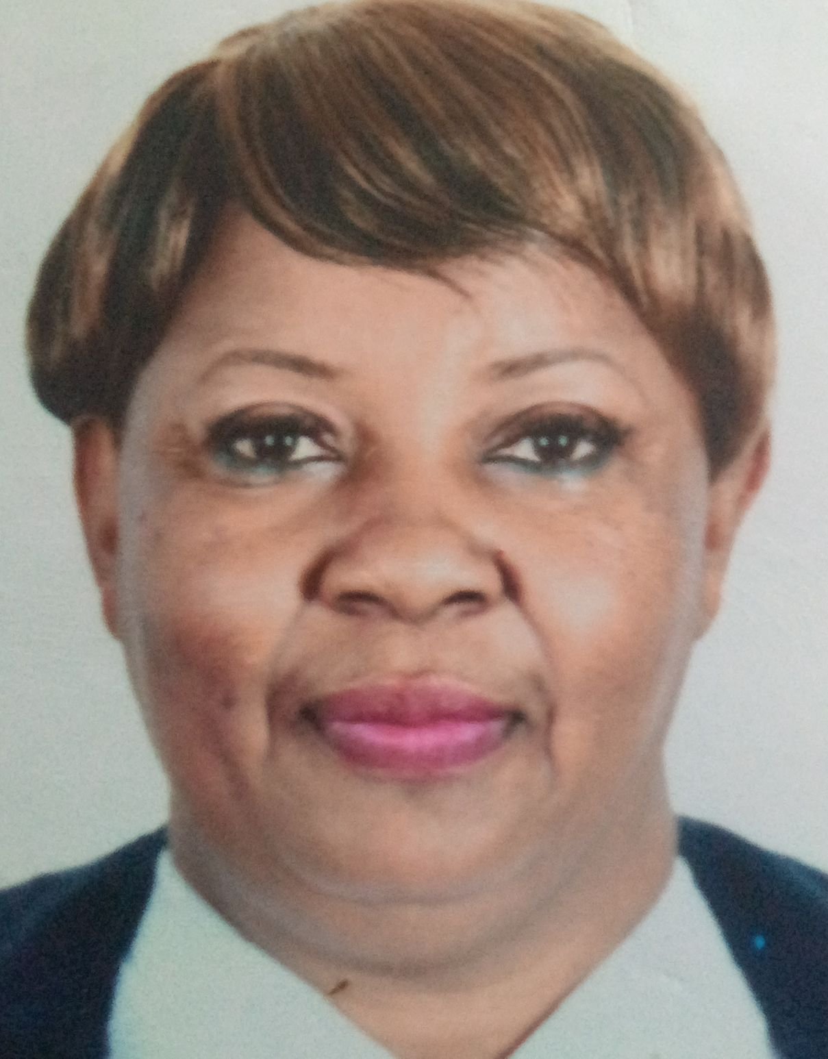 TRACY EBUN AGOL